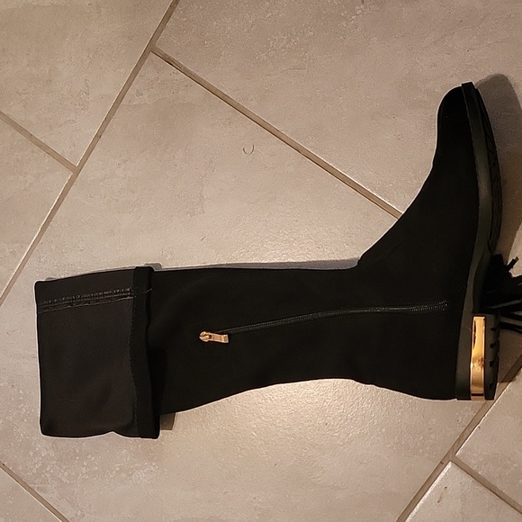 Knee-length boots with gold heel accent, side zipper, and adjustable back laces. - Picture 12 of 14